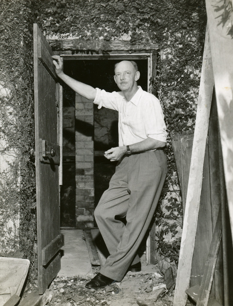 Bill Pidgeon (Wep) at the entrance to under his home at 85 Northwood Road where he kep his pottery wheel and kiln; Jan 1969