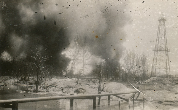 Oil wells at Seria set alight by the Japanese before departing