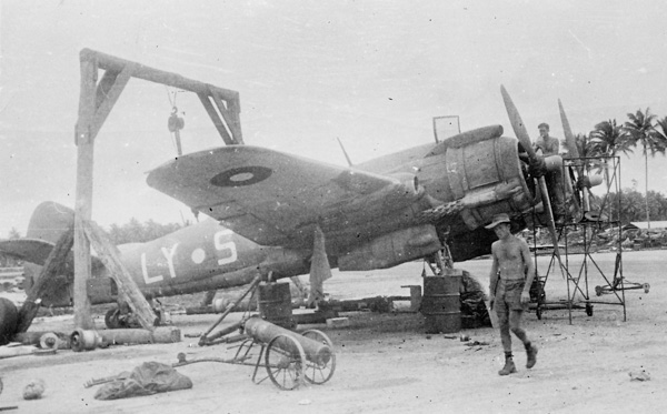 Ground crew performing maintenance on a Bristol Beaufighter of R