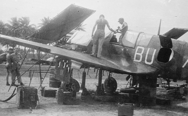 Kittyhawk BU-A of RAAF 80 Squadron being serviced by ground crew